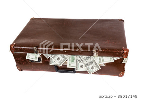 old closed brown suitcase full of hundred dollar banknotes isolated on white background 88017149