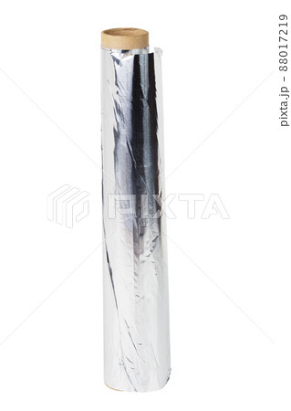 a roll of opened cooking foil isolated on white background 88017219
