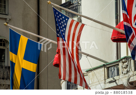 Flags of Great Britain, USA and Sweden on the facade of the hotel Flags of Great Britain, USA and Sweden on the facade of the hotel 88018538