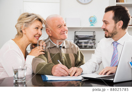 Old man and woman in social department Old man and woman in social department 88025785