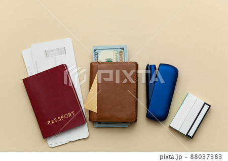Iqos electronic blue cigarette on a beige background. Iqos electronic blue cigarette on a beige background. 88037383