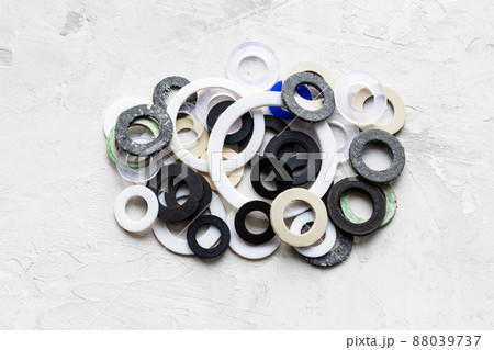 pile of various gaskets for plumbing water systems 88039737