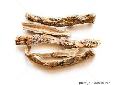 several pieces of dried Sweet flag root on white several pieces of dried Sweet flag root on white 88040197