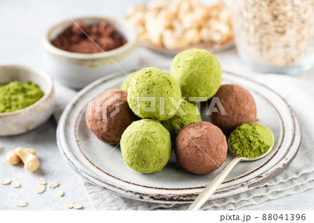 Homemade Vegan green matcha and carob truffles 88041396