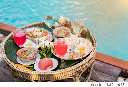 Float breakfast at the swimming pool for traveler at the Hotel. Food for holiday Float breakfast at the swimming pool for traveler at the Hotel. Food for holiday 88044093