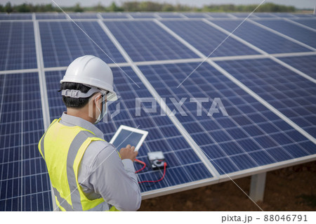 Electrical engineering works with solar panels to produce renewable energy. Electrical engineering works with solar panels to produce renewable energy. 88046791