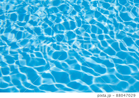 Blurred transparent ripple of blue clear water texture in a swimming pool in sunlight. 88047029