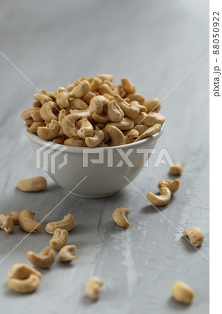 group of nuts on grey concrete background, healthy food concept 88050922
