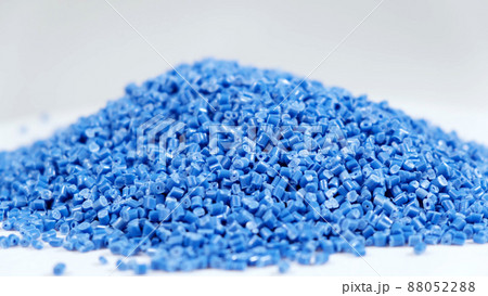 Secondary granule made of polypropylene, Blue Plastic pellets crumbles to the table. Plastic raw materials in granules for industry. Polymer resin. Raw plastic recycling concept Secondary granule made of polypropylene, Blue Plastic pellets crumbles to the table. Plastic raw materials in granules for industry. Polymer resin. Raw plastic recycling concept 88052288
