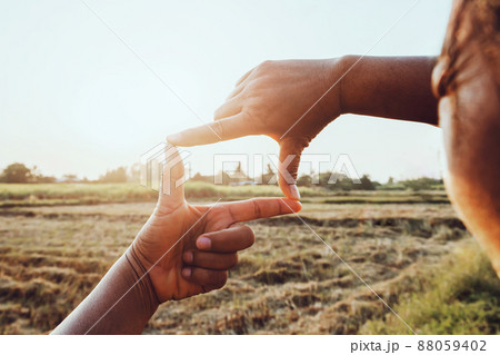 close up woman make hand framing gesture distant view. business concept close up woman make hand framing gesture distant view. business concept 88059402