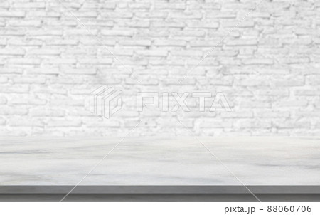 Empty white marble table top with brick wall background 88060706