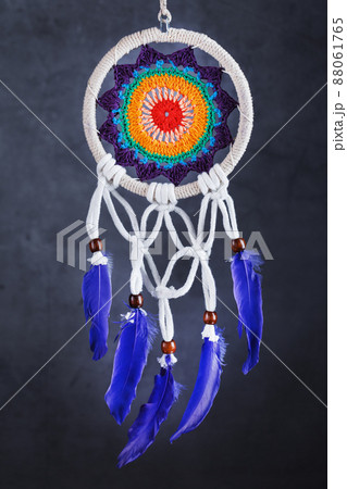 Amulet Dreamcatcher on a black background close-up protecting the sleeper from evil spirits Amulet Dreamcatcher on a black background close-up protecting the sleeper from evil spirits 88061765
