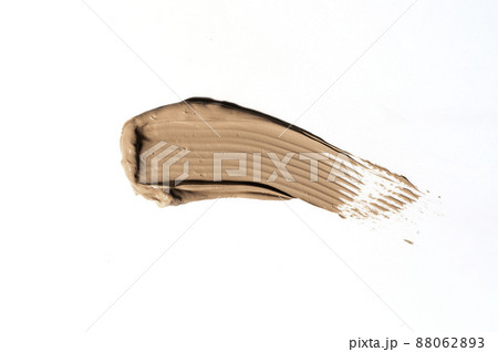 Creamy foundation smeared on white background. Isolated. Beauty and fashion conception. Creamy foundation smeared on white background. Isolated. Beauty and fashion conception. 88062893