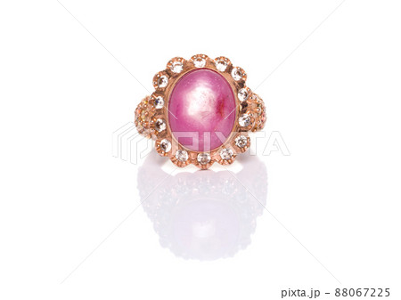 Ruby Sapphire and Diamond Jewel or gems ring on white background with reflection. Collection of natural gemstones accessories. Studio shot Ruby Sapphire and Diamond Jewel or gems ring on white background with reflection. Collection of natural gemstones accessories. Studio shot 88067225