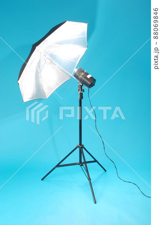 Studio strobe isolated on the blue background 88069846