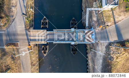 Top view aerial with drone of a Draw Bridge over the canal Dessel-Schoten in Rijkevorsel, Antwerp Top view aerial with drone of a Draw Bridge over the canal Dessel-Schoten in Rijkevorsel, Antwerp 88072846