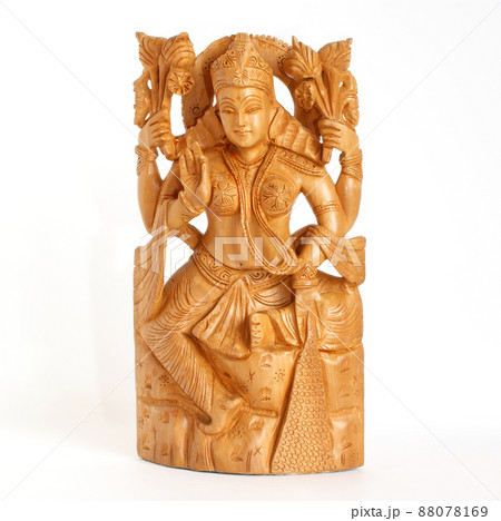 The wooden figure of God, a souvenir gift, India, in isolation 88078169