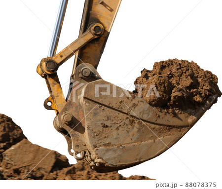 excavator with a great bunch of land, isolated on a white excavator with a great bunch of land, isolated on a white 88078375