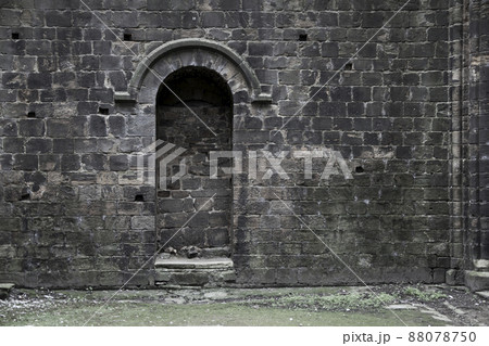 Bricked up doorway in an old gothic building Bricked up doorway in an old gothic building 88078750