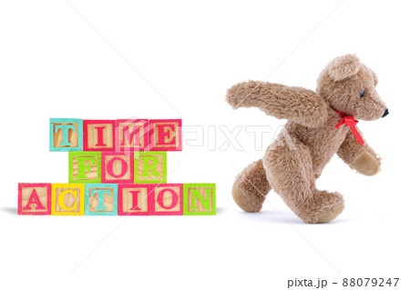 Time for action business concept with wood blocks and teddy bear 88079247