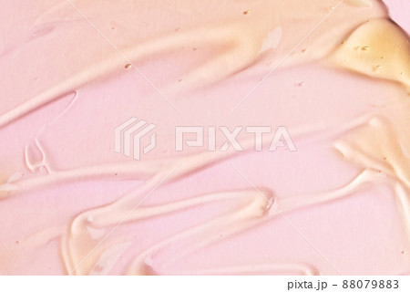 Liquid gel texture closeup on pink background. Cosmetic product texture Liquid gel texture closeup on pink background. Cosmetic product texture 88079883