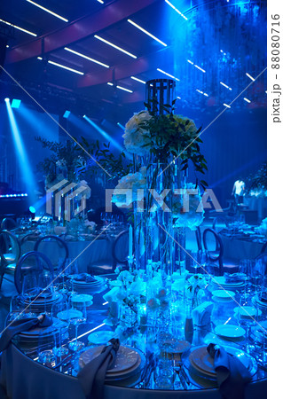 Table setup in blue light. Ready to event. 88080716