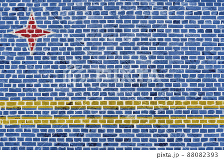 Flag of Aruba painted on a brick wall Flag of Aruba painted on a brick wall 88082393