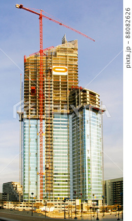 Sunny skyscraper construction 88082626