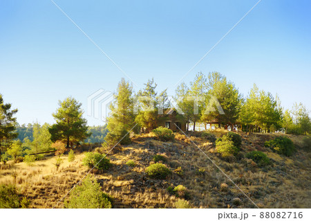Aerial view of picturesque landscape in the Troodos mountains on a sunny summer day. National park "Troodos Mountains", Cyprus Aerial view of picturesque landscape in the Troodos mountains on a sunny summer day. National park "Troodos Mountains", Cyprus 88082716