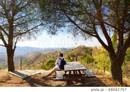 Man in the Troodos mountains on a summer day. National park "Troodos Mountains", Cyprus Man in the Troodos mountains on a summer day. National park "Troodos Mountains", Cyprus 88082767