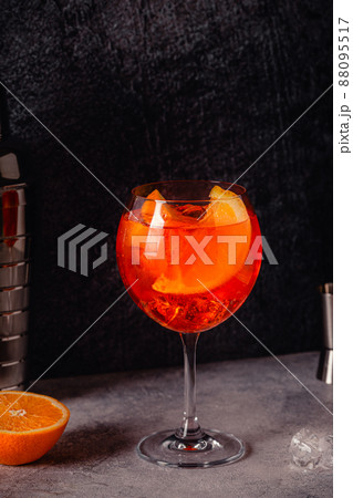Glass of cold Aperol spritz cocktail. Glass of cold Aperol spritz cocktail. 88095517