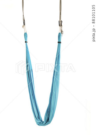 Blue yoga hammock. Sports equipment for exercise antigravity fly yoga or aerial gymnastics on white background. Blue yoga hammock. Sports equipment for exercise antigravity fly yoga or aerial gymnastics on white background. 88101105