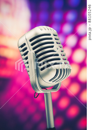 retro microphone on purple disco background 88105246