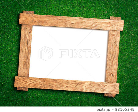 wooden frame on green 88105249