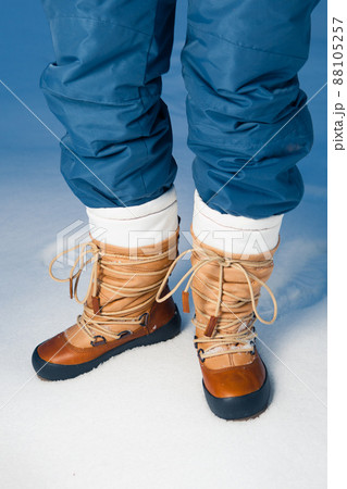 winter shoes in snow, close-up winter shoes in snow, close-up 88105257