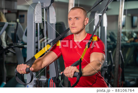 Handsome man working out in fitness gym Handsome man working out in fitness gym 88106764
