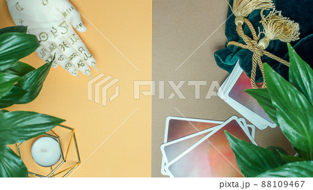 Concept of divination, magic and esotericism. Cards candle on cartomancy table. Concept of divination, magic and esotericism. Cards candle on cartomancy table. 88109467