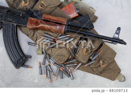Kalashnikov ak gun and Chicom Chest Rig with 7,62 mm cartridges Kalashnikov ak gun and Chicom Chest Rig with 7,62 mm cartridges 88109713