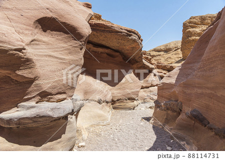 An amazing place in Israel is called the Red canyon and Nahal Shani, Southern District. Totally worth visiting because of its stunning stony structure  88114731