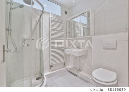 interior of a modern total white bathroom. modern style with every comfort 88116039