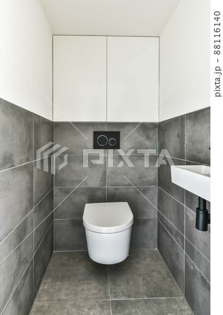 Luxurious toilet with unusual branded wall tiles Luxurious toilet with unusual branded wall tiles 88116140