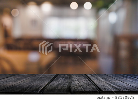 Wood table with blur  in coffee shop cafe For montage product display table copy space cafe background with copy space for text 88120978