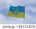 Blurred Ukrainian flag fluttering in strong wind. 88121628