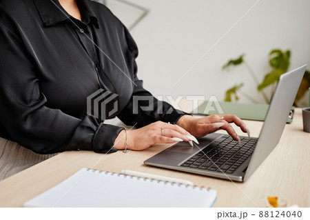 Woman with Manicure Typing at Keyboard Woman with Manicure Typing at Keyboard 88124040