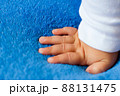 Child's hand on a blue veil,full hd video 88131475
