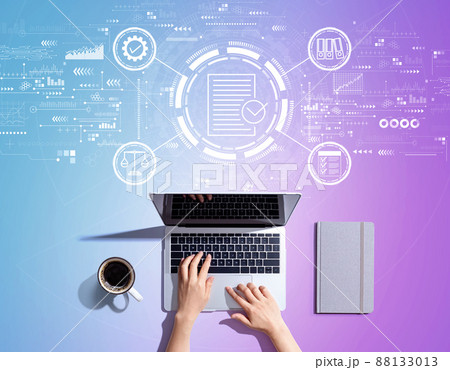 Compliance concept with person using a laptop Compliance concept with person using a laptop 88133013