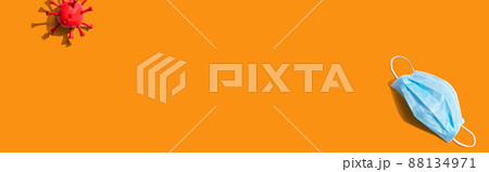 Surgical mask with influenza and Coronavirus concept 88134971