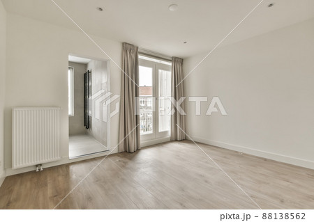 modern, empty apartment with panoramic doors and curtains on the cornice 88138562
