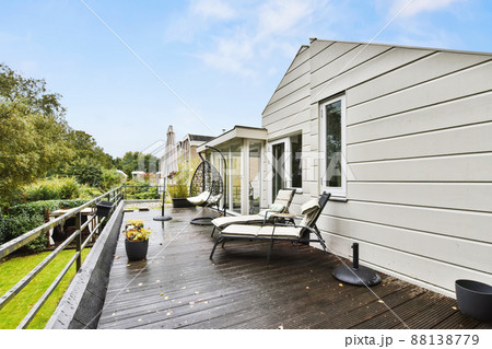 Cozy balcony with black sun beds and black floor 88138779