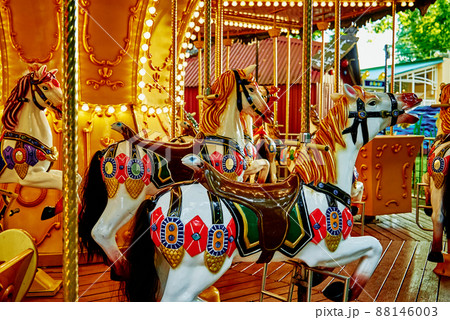 Horse carousel at amusement park Horse carousel at amusement park 88146003
